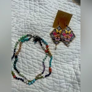 Two piece plunder Jewery set. Necklace and earrings. Brand new.